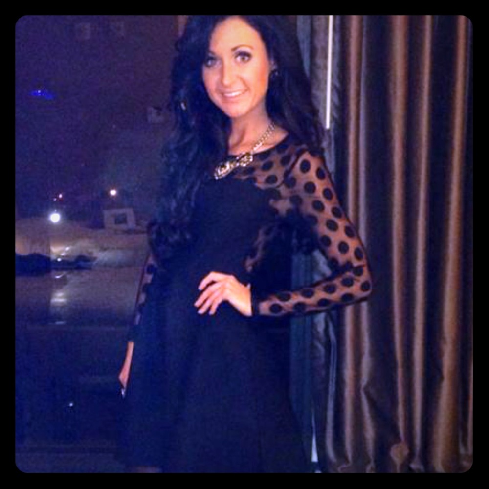 Black dress with sheer polka dot sleeves